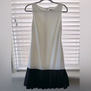 White and black pleated dress. Worn once and in excellent condition.